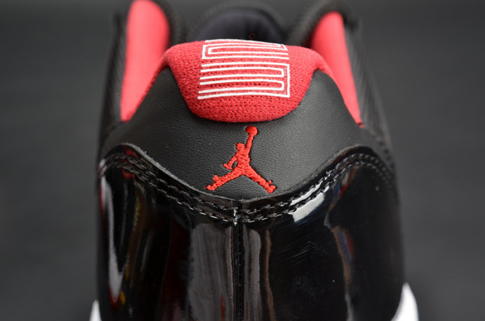 air jordan 11 retro low "bred" black/ red mens 528895-012