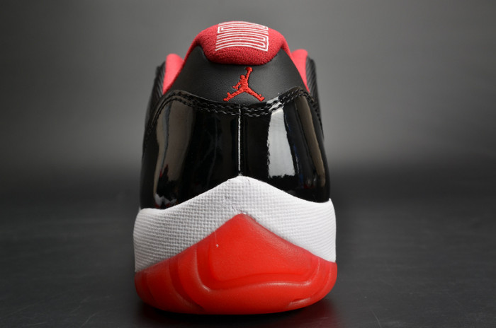 air jordan 11 retro low "bred" black/ red mens 528895-012